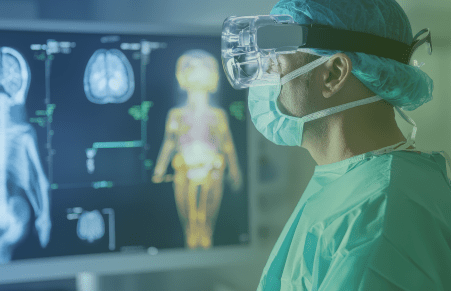 Surgeon reviewing scans