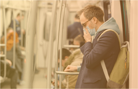 Man with medical mask on train