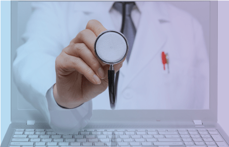 Doctor coming out of computer screen representing telehealth