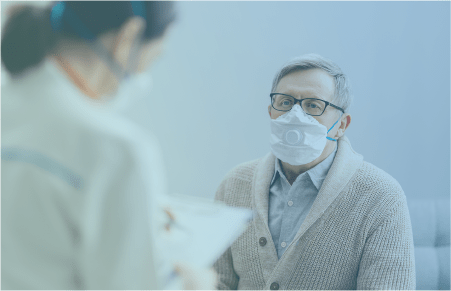 Elderly man in a mask