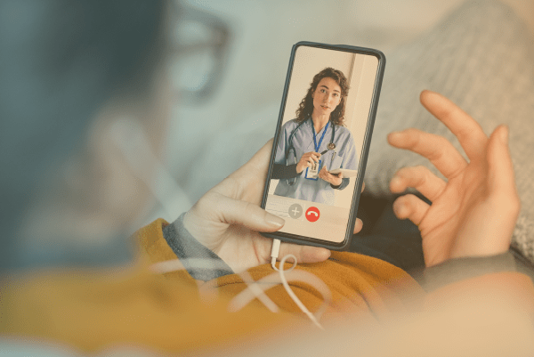 Person in a virtual visit appointment with a doctor on video call