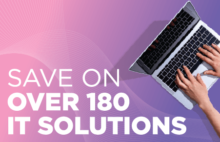 Hands typing on laptop