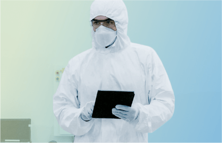 Person wearing full personal protective equipment hazmat suit
