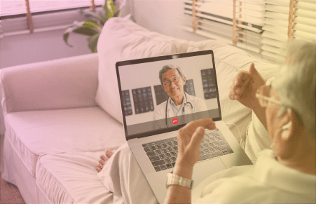 Elderly man talking to virtual visit physician doctor