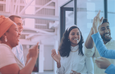 team members high fiving and smiling