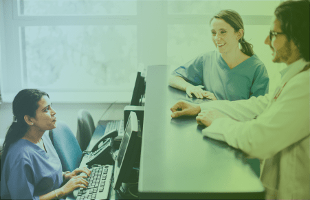 Physicians office front desk with patients and doctor
