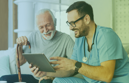 Doctor with elderly patient holding a cane