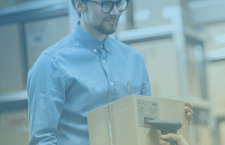 Man scanning box