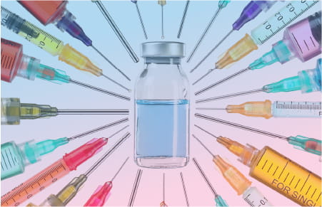 needles surrounding vial