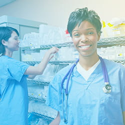 Nurse smiling and checking inventory